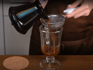 How to Make Jamaican Coffee - Strain and Serve