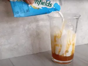Homemade Recipe Iced Caramel Latte - Pour and Mix the Milk
