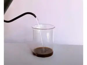 How to Make a Iced Vanilla Latte - Dissolve the Coffee