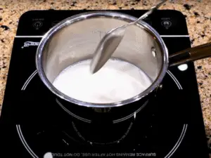 how to make cafe con leche - Heat the Milk